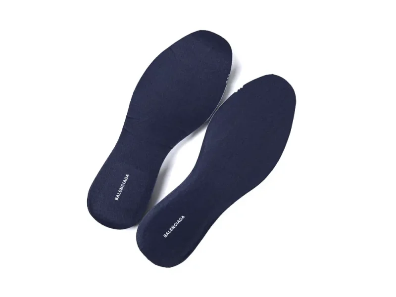 Navy blue fabric insoles with branding, designed for comfort and support.