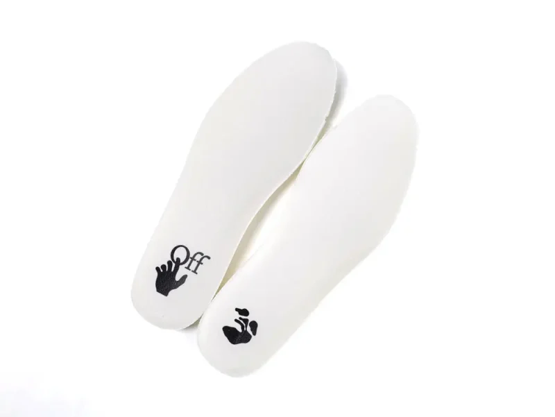 White foam shoe insoles with black printed graphics on the heel area.