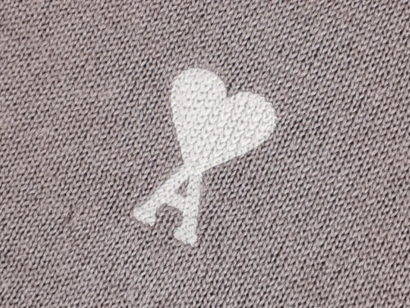 White heart and letter 'A' design.