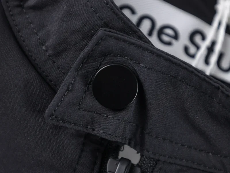 Button and zipper detail.