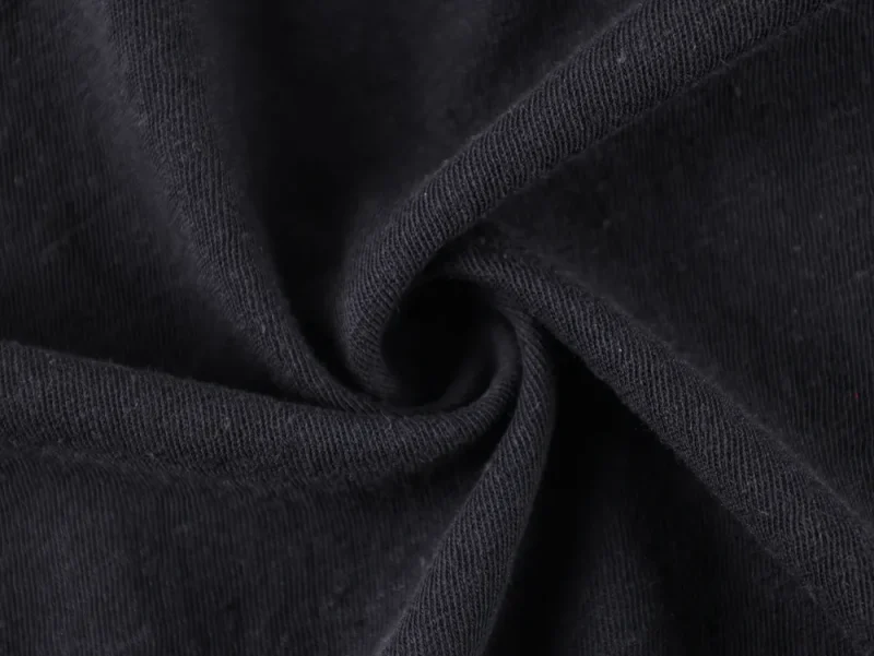Black fabric material swirled