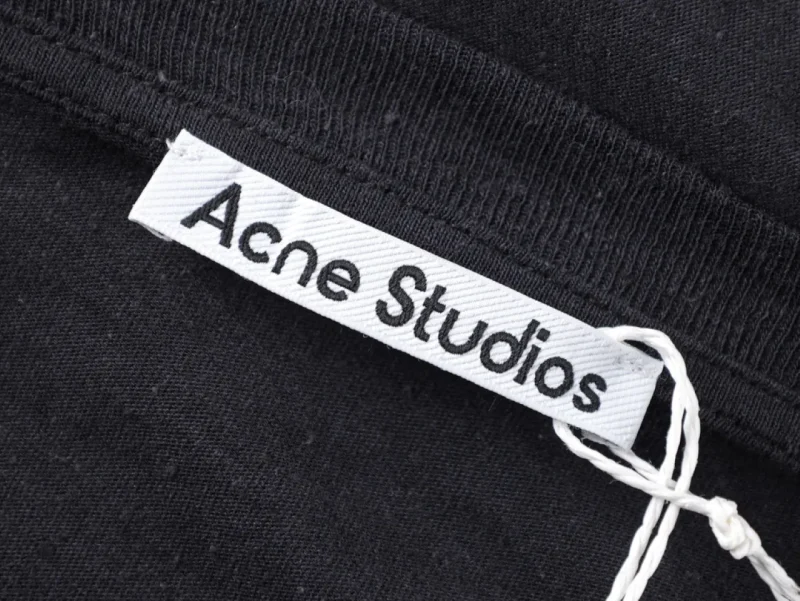 Cotton with Displaying "Acne Studios" in black text.
