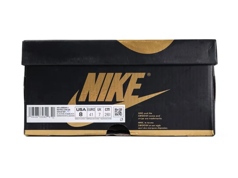 Black and gold cardboard shoe box with Nike logo and size information.