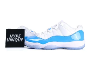 White and blue sneakers with glossy finish and rubber sole, displayed beside branding card.