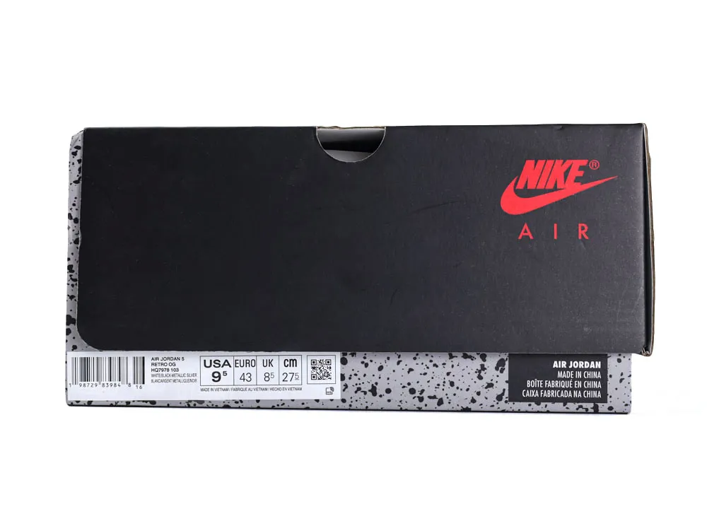 Black and gray cardboard shoe box with red logo and speckled pattern detailing.
