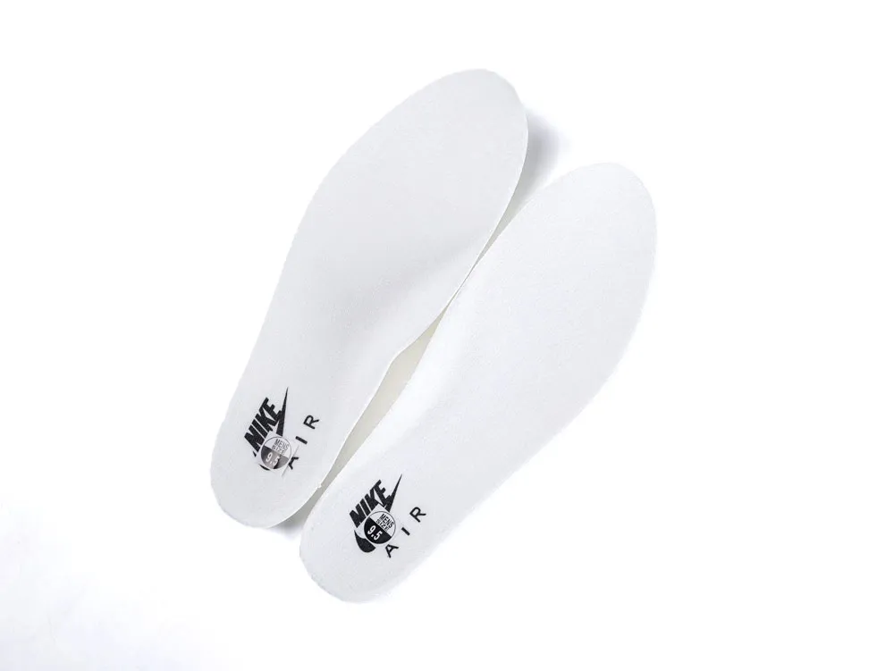 White foam insoles with black logo, designed for comfort and support.
