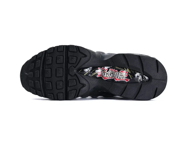 Black rubber sneaker sole with textured pattern and graphic design in the center.