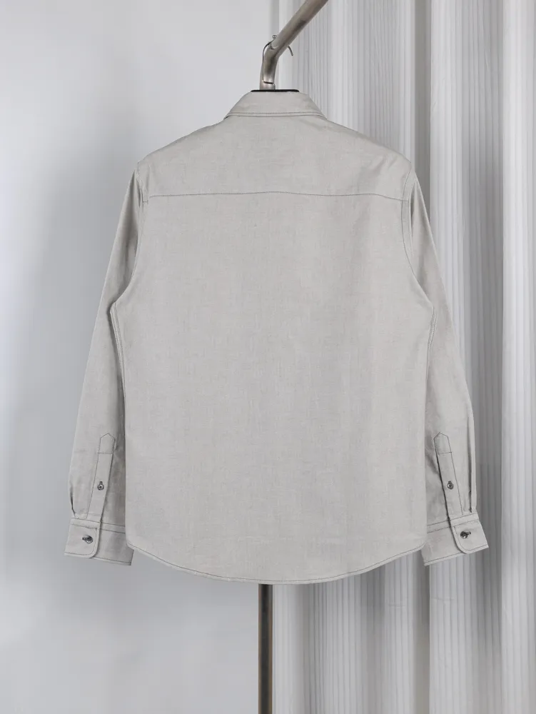 Back view, with buttoned cuffs and collar.