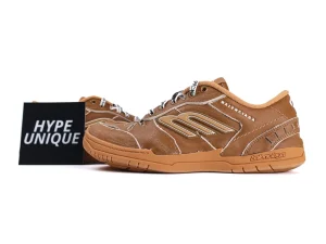 Brown leather sneakers with rubber soles and logo detailing, displayed beside "Hype Unique" card.