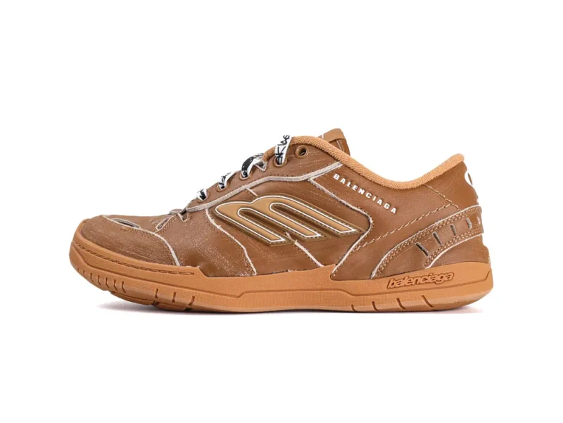 Brown leather sneaker with stitched details and a rubber sole.