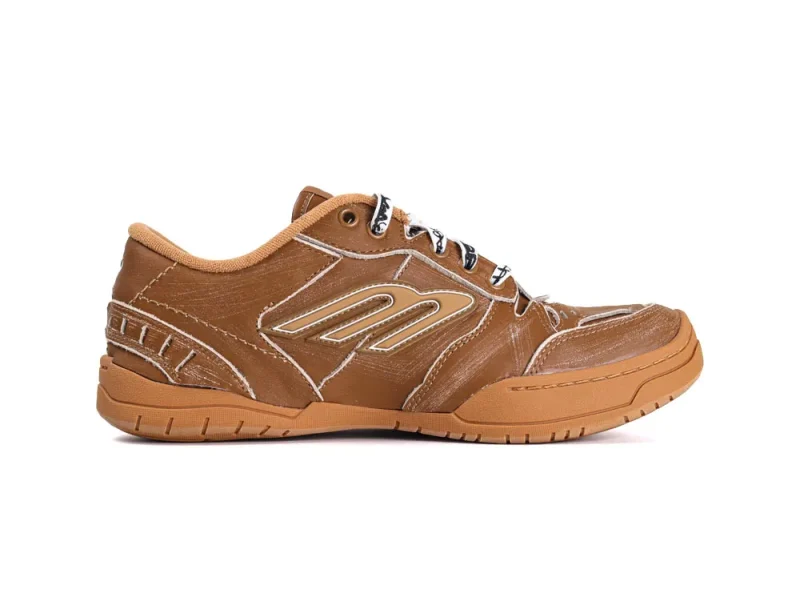 Brown leather sneaker with rubber sole and black laces, side view.