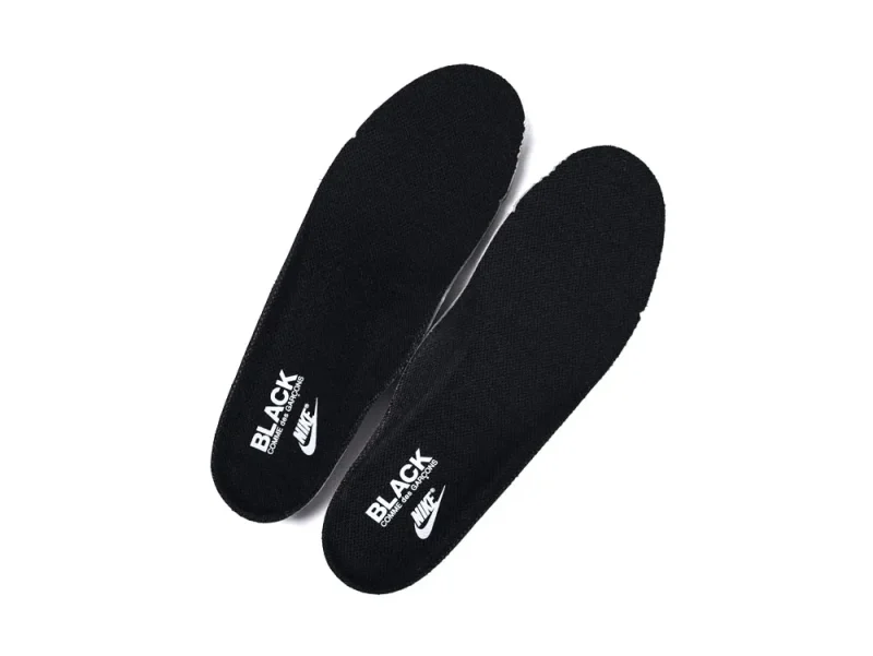 Black fabric shoe insoles with white logos, designed for comfort and support.