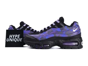 Purple and black camo sneakers with a synthetic upper and black sole.