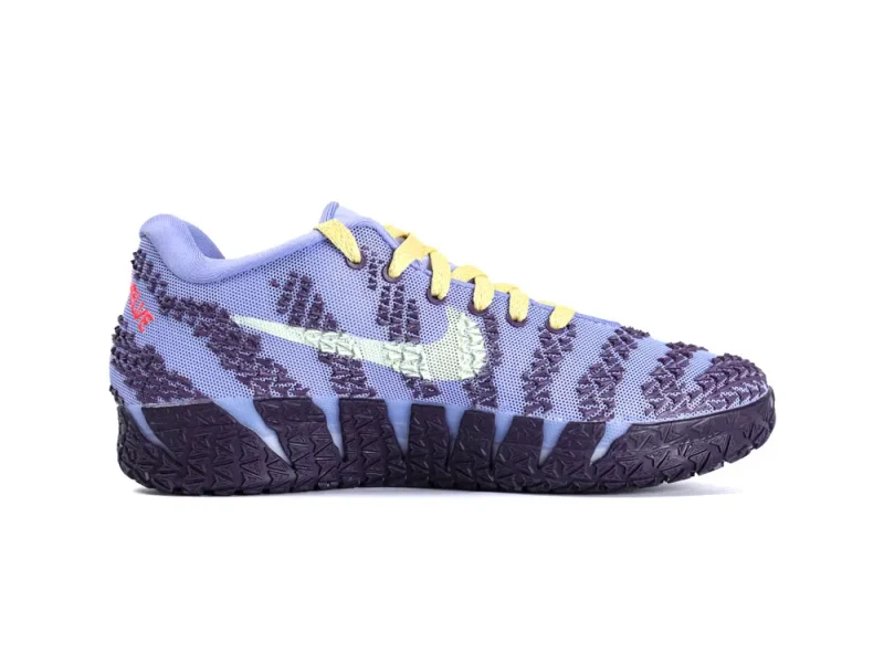 Purple sneaker with a textured fabric upper, yellow laces, and dark textured sole.