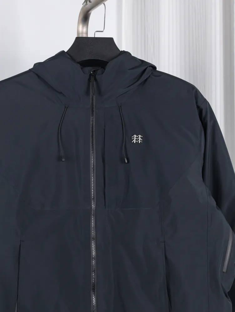 Hooded jacket with zipper, made from a waterproof material.