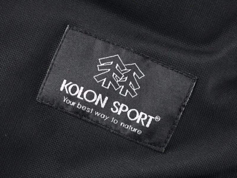 Tag with white embroidery on Kolon Sport