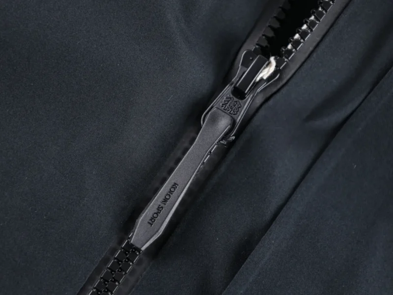 Close-up of a black metal zipper
