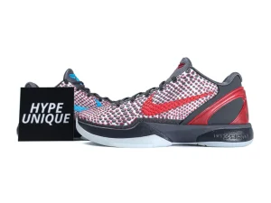 Patterned sneakers with red accents, gray leather upper, and rubber sole on display.