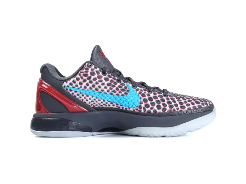 Gray sneaker with a mesh upper, red accents, and blue swoosh logo.