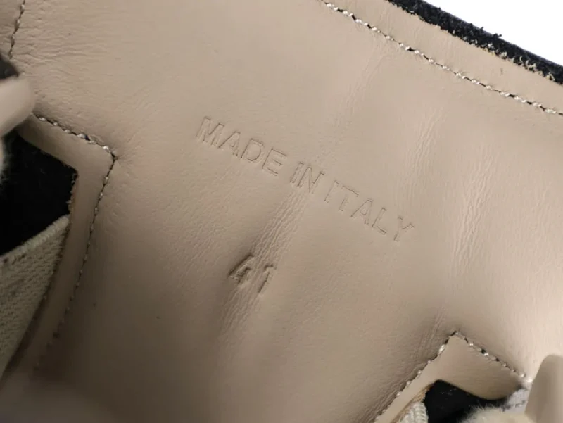 Beige leather interior with stitching detail, embossed with "MADE IN ITALY", size 41.