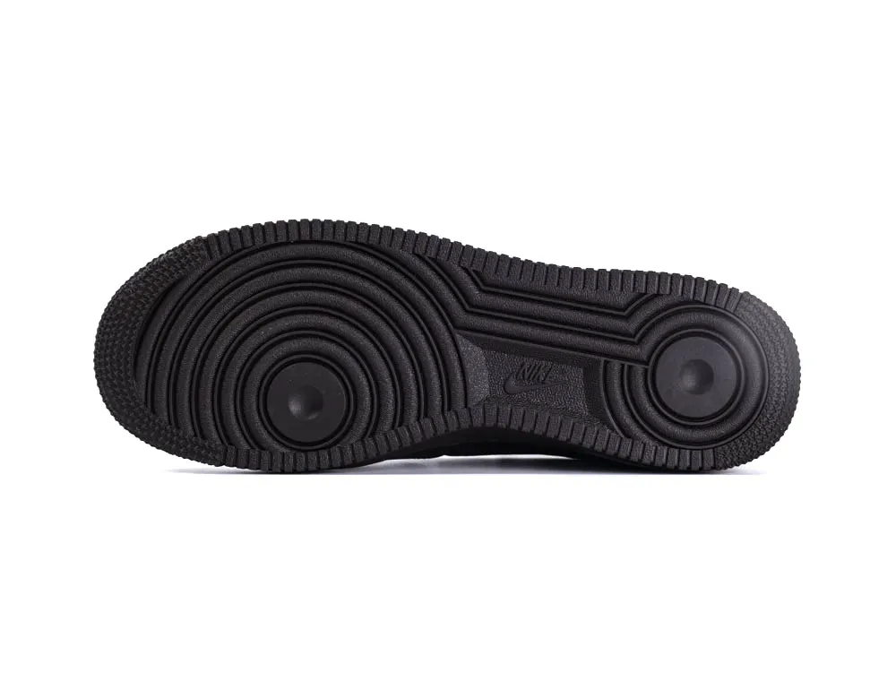 Black rubber sole with circular tread pattern for enhanced grip and stability.
