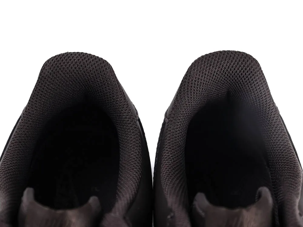 Black textile shoe interiors with mesh padding, providing enhanced comfort and breathability.