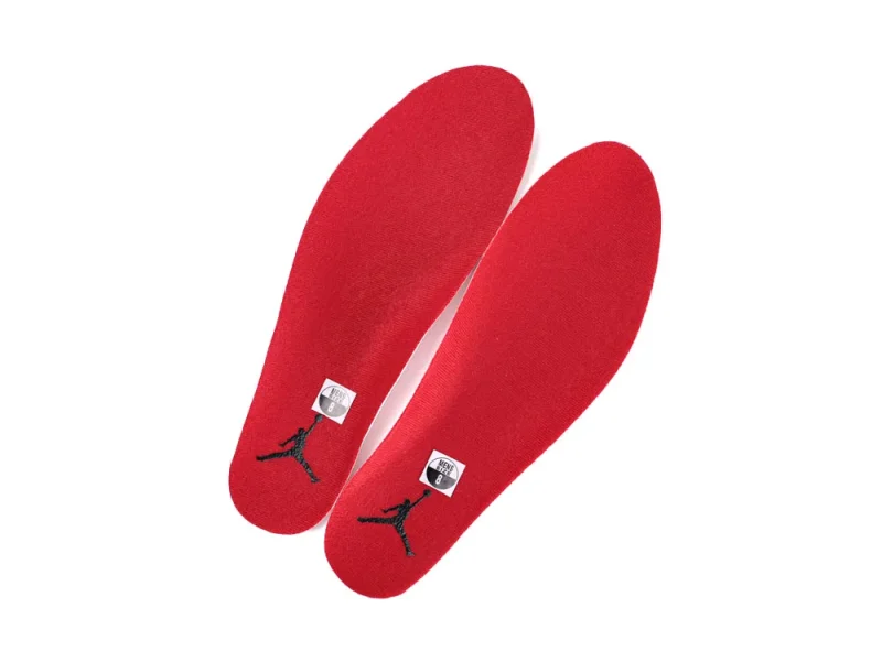 Red fabric shoe insoles featuring a logo design at the heel area.