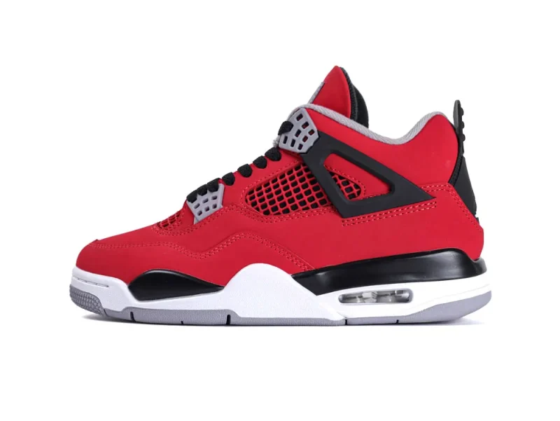 Red sneaker with suede finish, black mesh accents, and white sole detailing.