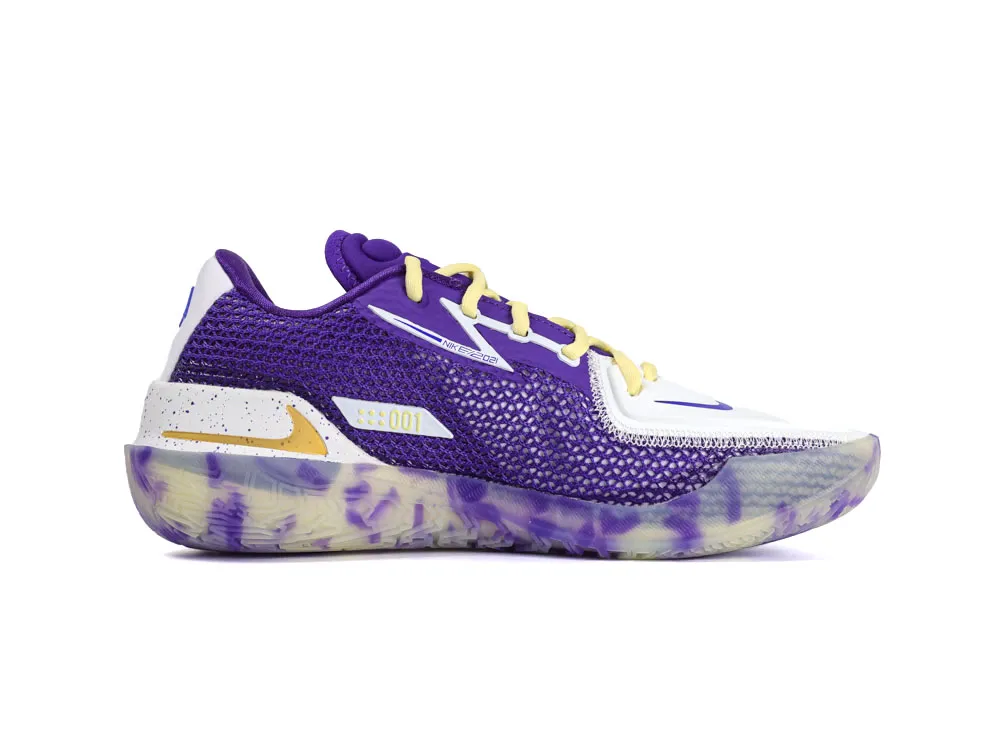 Purple and white mesh sneaker with yellow laces and translucent patterned sole.