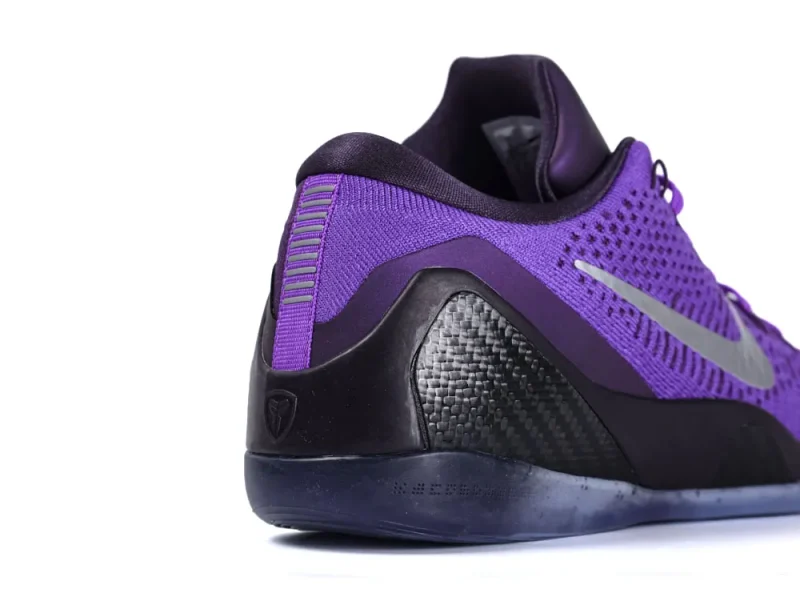 Purple sneaker with mesh material, black carbon fiber heel, and silver logo swoosh.