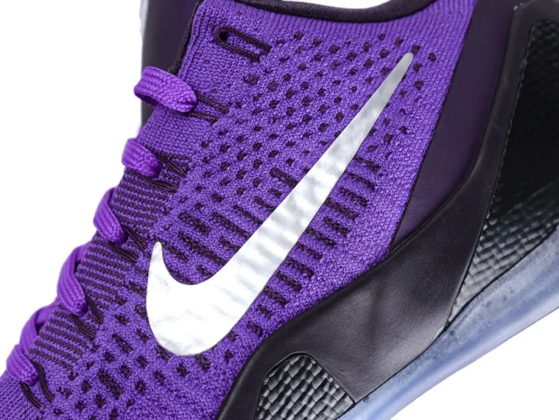 Purple knit sneaker upper with black accents and a white swoosh logo.