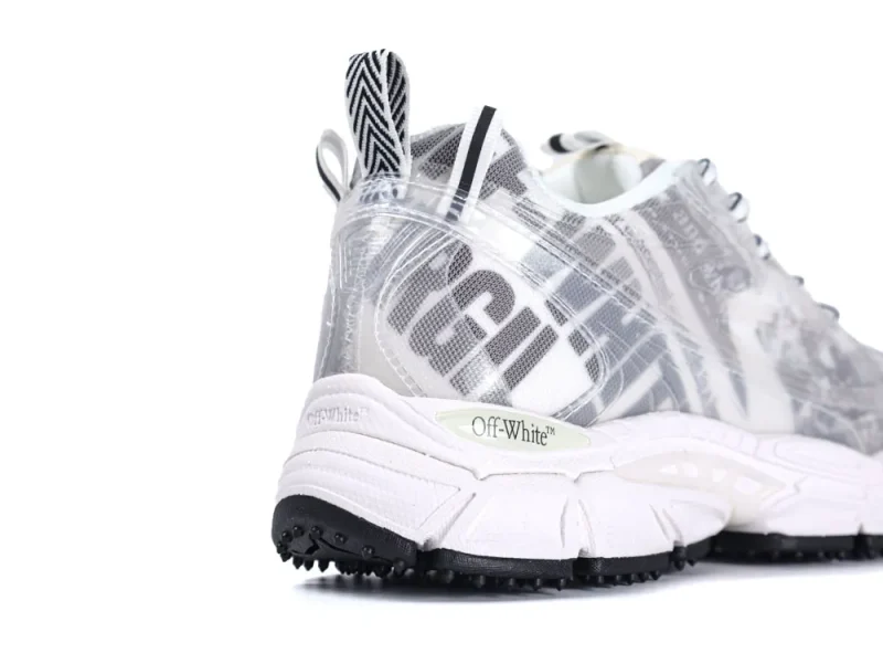 White sneaker with a transparent upper and black accents, featuring rugged tread.
