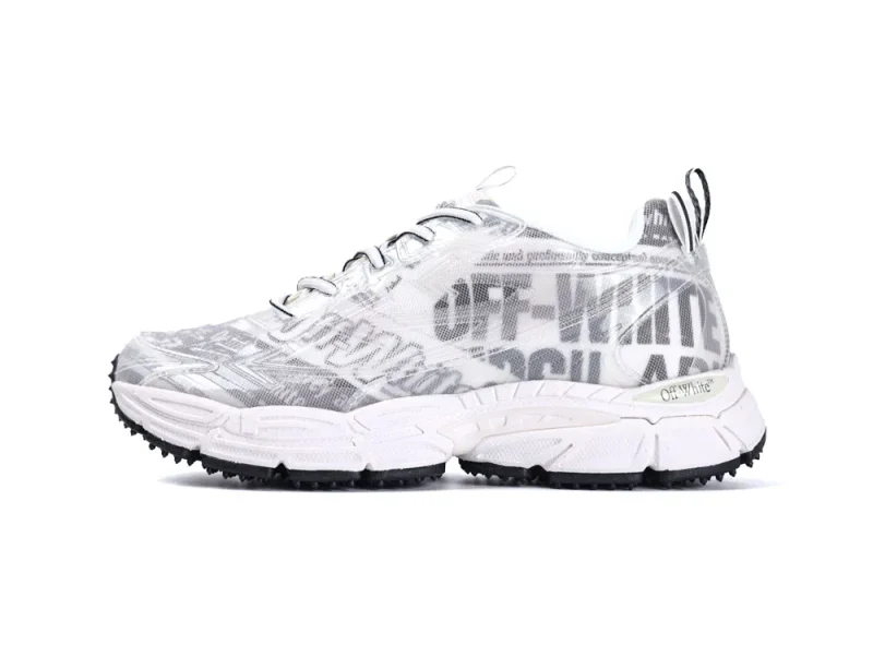 White sneaker with translucent mesh upper and black text accents on the side.
