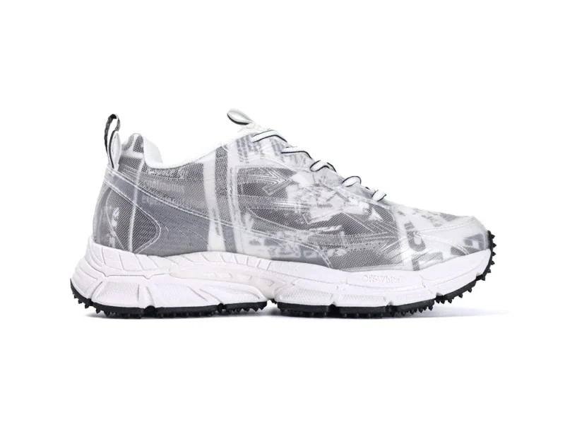 White and gray sneaker with printed mesh material, rubber sole, and lace-up design.
