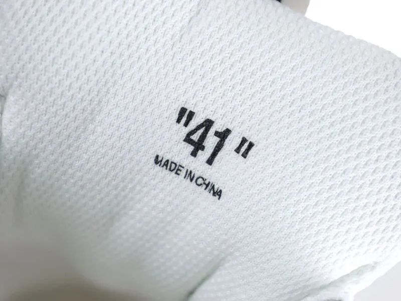 White textured fabric with black text, showing size "41" and "Made in China".