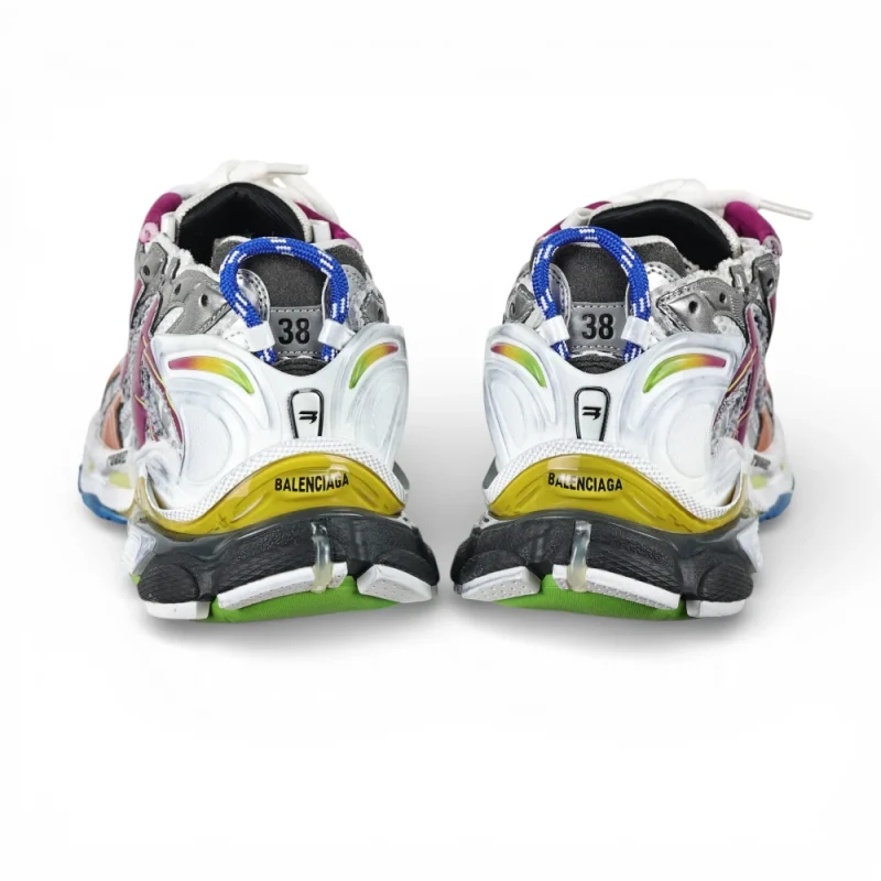 Multicolored sneakers with rubber soles and mesh uppers, featuring bold branding on heel.