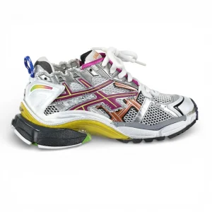 Multicolored sneaker with silver mesh, rubber sole, and leather accents, featuring vibrant hues.