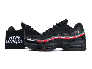 Black sneaker with leather and mesh material, featuring a colorful striped side design.