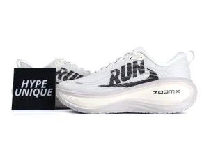 White mesh running shoe with black lettering and thick white ZoomX sole.