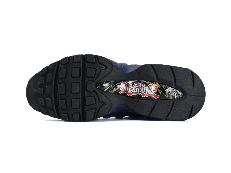 Black rubber shoe sole with a graphic pattern featuring red and white elements.