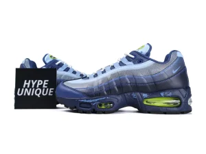 Blue and gray mesh sneakers with green air cushioning and black rubber soles.