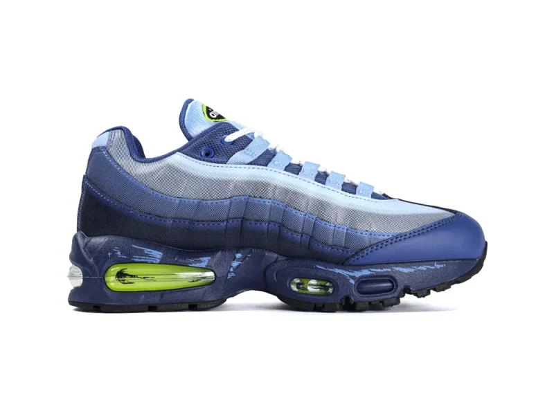Blue gradient sneaker with mesh upper, leather overlays, and lime green air cushioning.