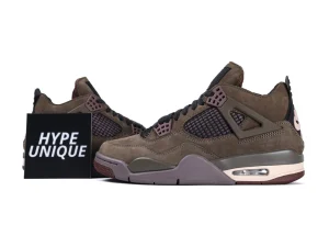 Brown suede sneakers with mesh panels and rubber soles, featuring a stylish design.