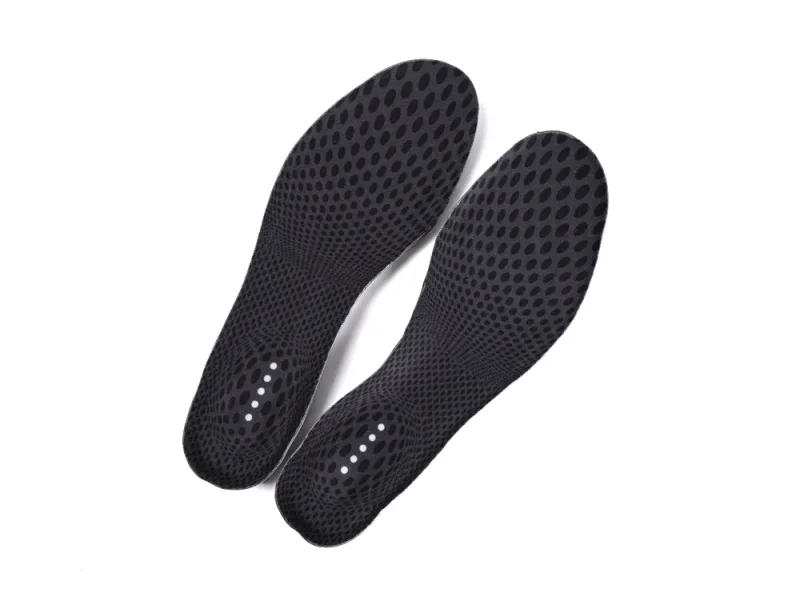 Black, perforated shoe insoles made of flexible material.