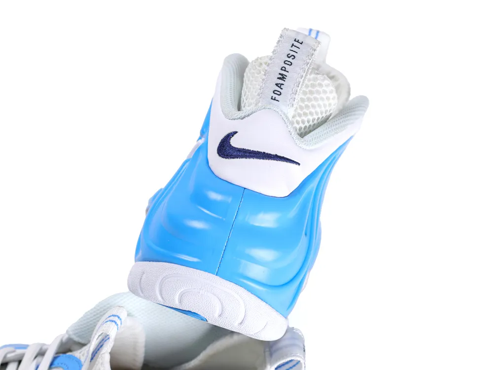 Blue foam material sneaker heel with white mesh and brand logo detail.