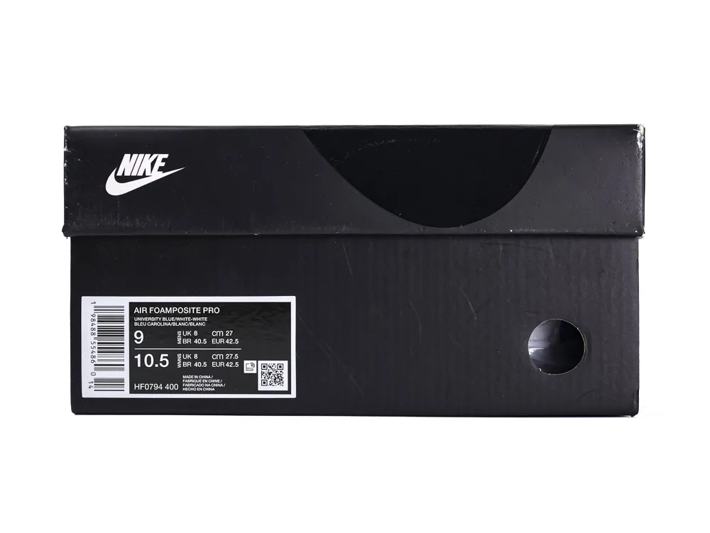 Black Nike shoe box with white logo and product label details.