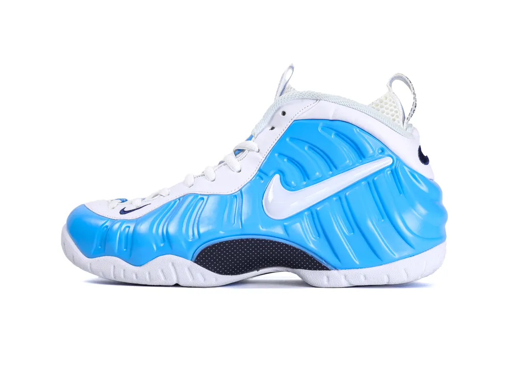 Blue and white sneaker, shiny material, featuring prominent white branding on the side.