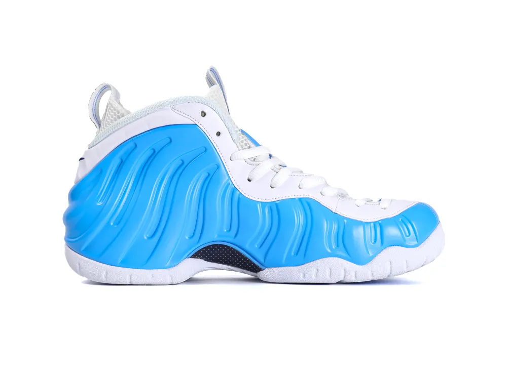Blue and white synthetic sneaker with textured side panel and mesh upper.
