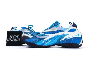 Blue and white athletic shoes with synthetic material and intricate design details.