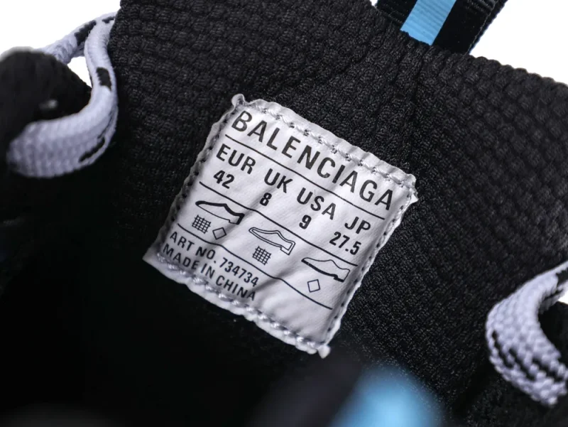 Black and white fabric sneaker label with sizing information and brand name.